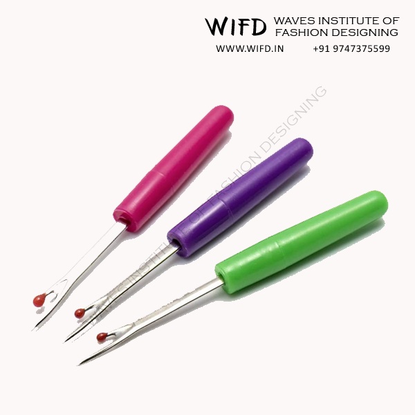 Seam ripper pen-shaped tool with small blade for safely removing stitches without cutting fabric