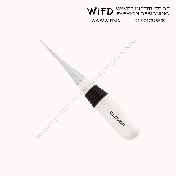 Tailor's awl pointed tool for making small holes in fabric and marking positions for buttons and darts