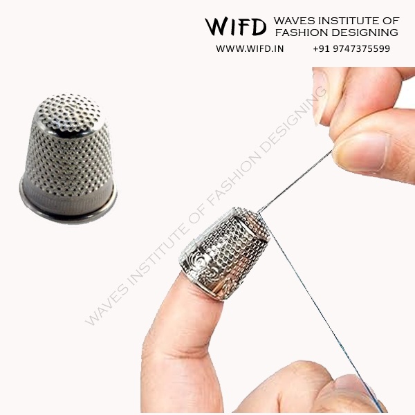 Sewing thimble worn on middle finger for protecting fingers and directing needles through fabric during hand sewing