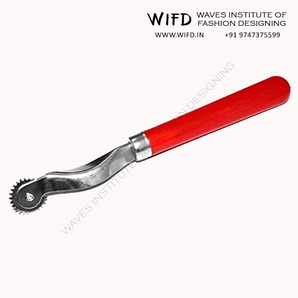 Tracing wheel with serrated teeth for transferring pattern markings from paper to fabric using carbon paper