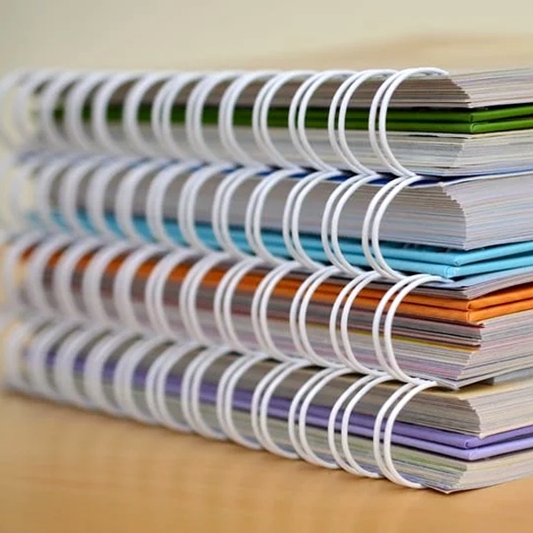Different binding methods for swatch books including ring binders, spiral binding, and hardcover options comparison Different binding methods for swatch books including ring binders, spiral binding, and hardcover options comparison