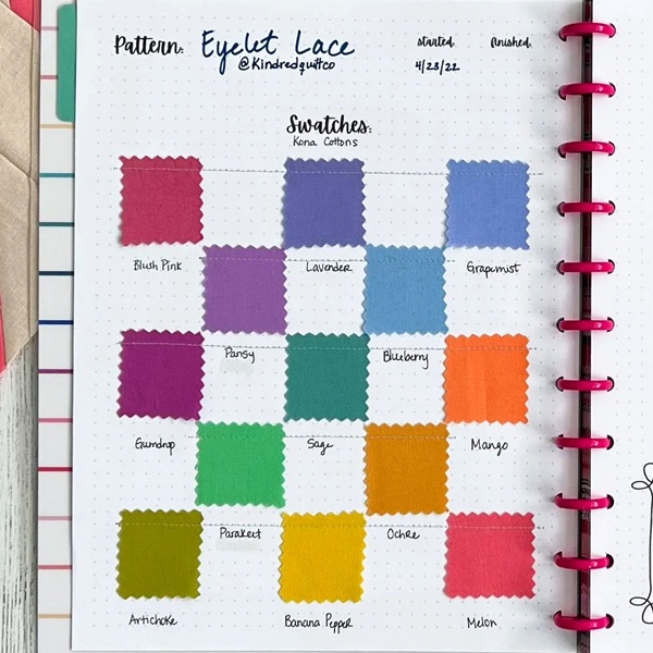 Well-organized swatch book pages showing clear fabric coding system, labels, and index for easy fabric identification Well-organized swatch book pages showing clear fabric coding system, labels, and index for easy fabric identification