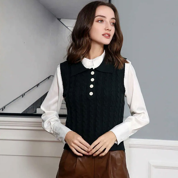 Modern corporate style combining black knitted sweater vest with crisp white shirt and sleek black leather pencil skirt for professional office wear