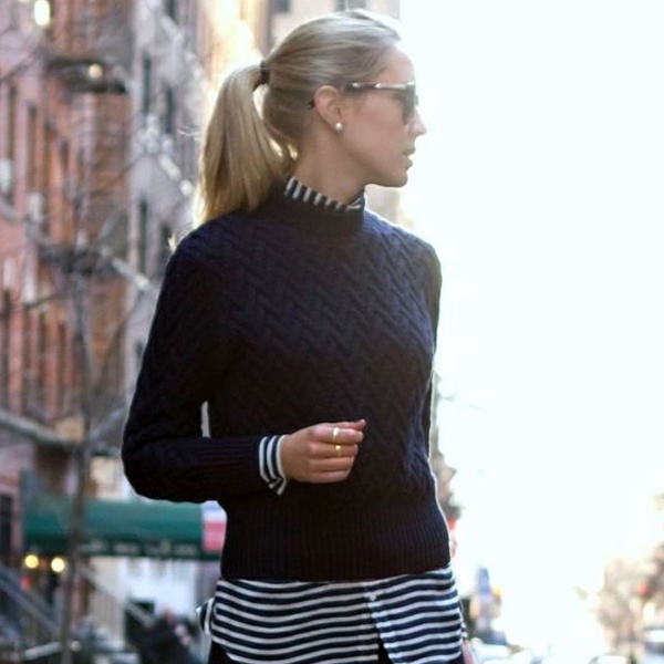 Classic preppy style argyle patterned knit vest in navy and burgundy over crisp white oxford shirt