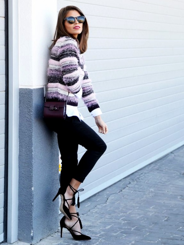 Casual chic outfit navy and white striped knit vest over untucked white shirt with black skinny jeans black lace-up block heels and maroon leather handbag