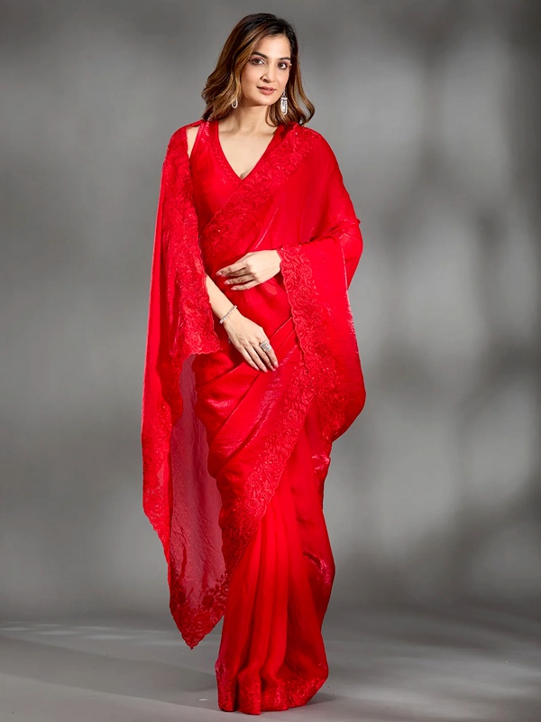 Traditional red tissue saree with intricate threadwork embroidery for Valentine's Day elegance
