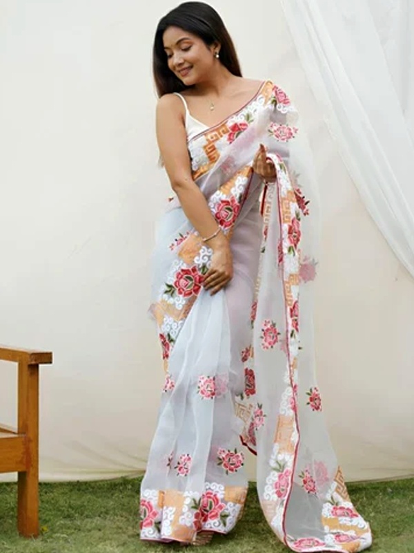 Elegant white semi-transparent saree with delicate floral embroidery for Valentine's sophistication